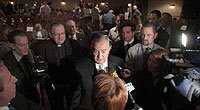 Louis DeNaples, center, owner of Mount Airy Lodge, speaks to reporters after testifying before the Pennsylvania Gaming Control Board at Split Rock Resort in Lake Harmony, Pa., Thursday. (AP Photo)